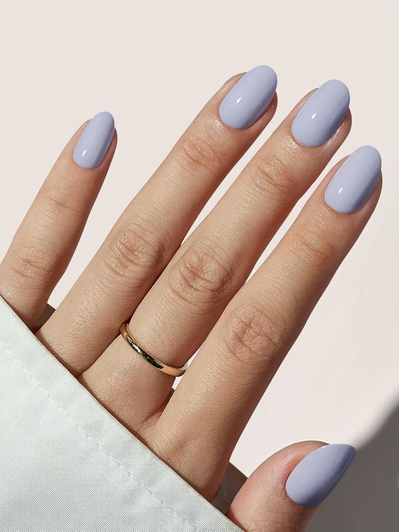 Uñas press on lila pastel almendra